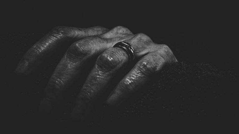 Close-Up Photography of a Hand With Ring